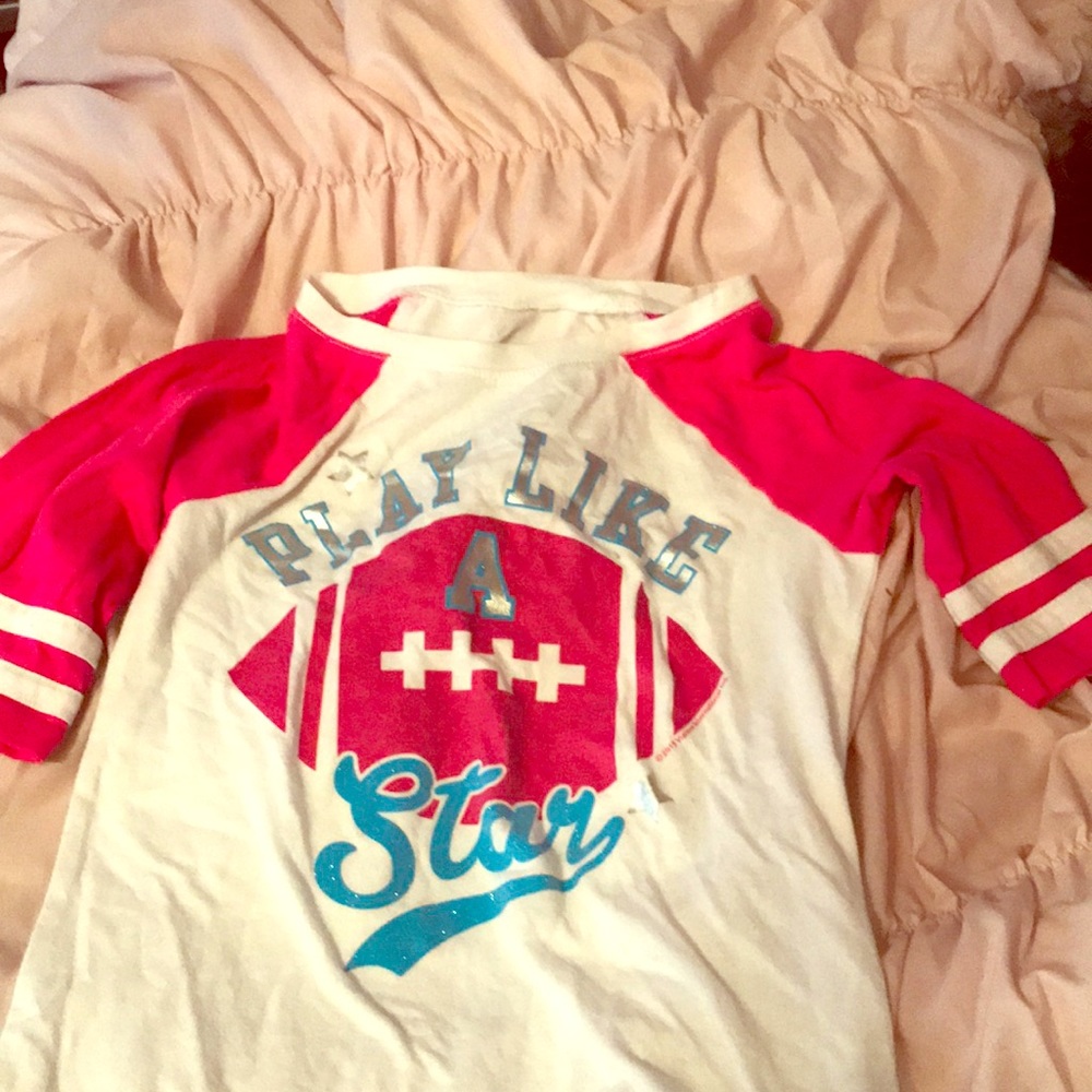a shirt from justice that’s been worn about twice